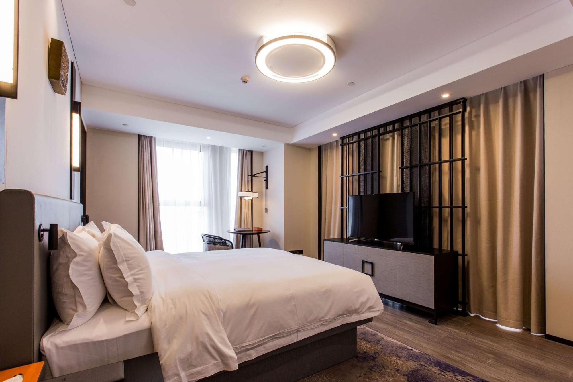 Howard Johnson By Wyndham Life Zhuoyuan Нінбо Екстер'єр фото